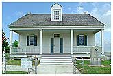 attractions_keepers_cottage Lighthouse Keepers Cottage, home to the Port Isabel Chamber of Commerce and Information Center.