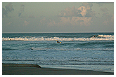 Waves from the Gulf of Mexico break onto the white sandy beaches of South Padre Island.